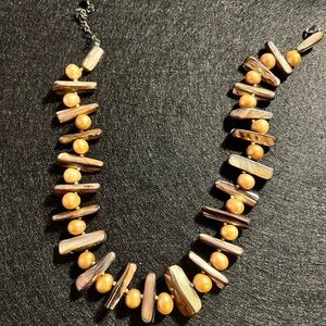 Unique Beaded Necklace with Orange and Brown Accents